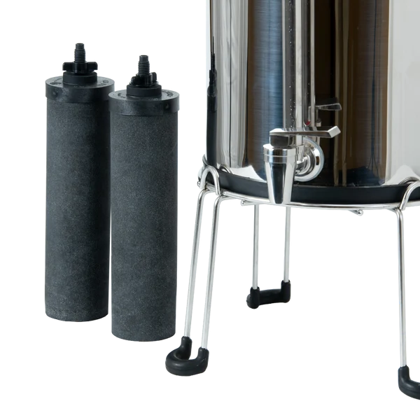 Two CB9 nano-filtration filter elements shown next to Woder Clearbrook 2.25 Gallon gravity water filter on stainless steel stand