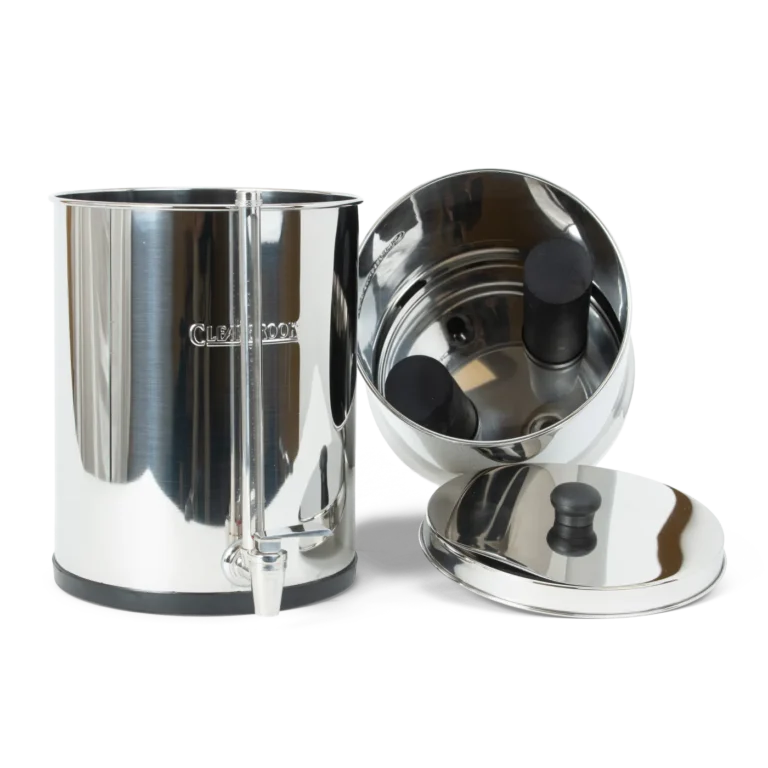Woder Clearbrook gravity water filter disassembled showing upper chamber with CB9 filter elements, lower vessel with spigot, and stainless steel lid